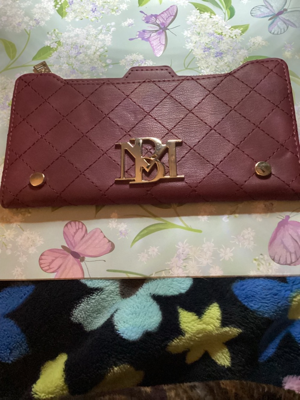Badgley Mischka Quilted Wine Clutch Wallet with Gold Logo